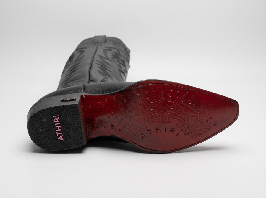 Athiri hand-tooled leather detail