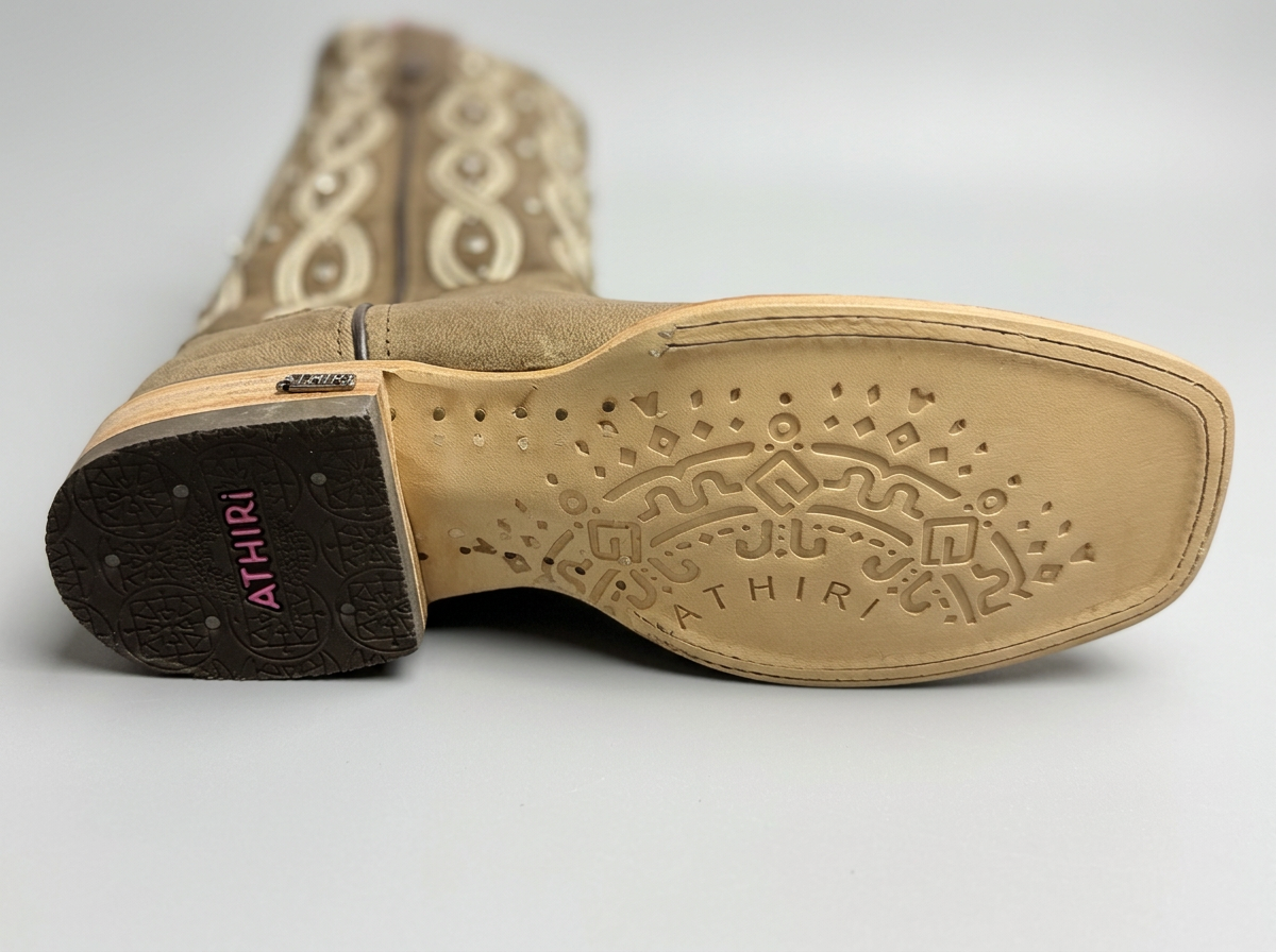 Premier cinnamon leather western boot — sole detail